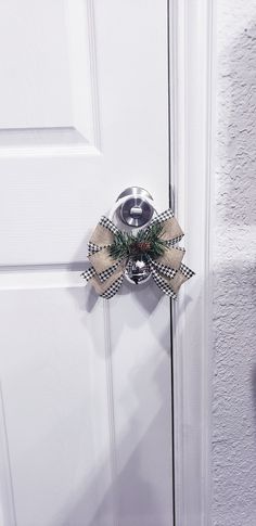 a door handle with a bow on it