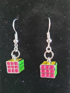 Multicolored Rubix Cube Earrings! Nickel-free Multicolor Rectangular Earrings, Multicolor Single Earring Jewelry Gift, Multicolor Single Earring As Gift, Hypoallergenic Multicolor Earrings For Parties, Nickel-free Multicolor Earrings For Party, Multicolor Nickel-free Earrings For Party, Multicolor Metal Earrings With Ear Wire, Multicolor Metal Ear Wire Earrings, Multicolor Rectangular Earrings As A Gift