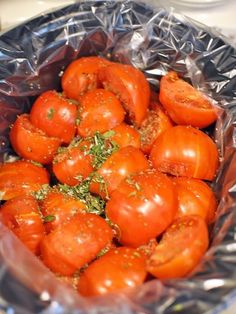 a bunch of tomatoes that are in some foil