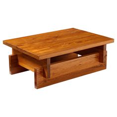 a wooden coffee table with two open drawers