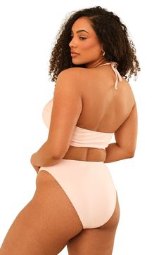 Ready to hit the coast? Our multi-wear Amalfi Top is the most versatile kini top. Wear it tied in the middle if you want a bandeau, tie the straps in the back for a scoop neck or criss-crossed for some eye-catching detail. Amalfi pairs great with our Seashore or Palma Bottom. 82% Nylon 18% Spandex Made in Vietnam Bandeau Tie straps Seamless Bandeau Halter Top For Beach Season Sunbathing, Beachwear Bandeau Halter Top For Swimming, Strapless Tie-back Swimwear For Sunbathing, Halter Neck Tube Top For Pool And Beach Season, Beachwear Halter Neck Tube Top For Beach Season, Vacation Halter Neck Tube Top For Beach Season, Beach Seamless Triangle Tube Top, Strapless Tie Back Swimwear For Beachwear, Strapless Tie-back Swimwear For Beachwear