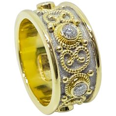 S.Georgios designer Diamond Band Ring is handmade from solid 18 Karat Yellow Gold. The beautiful Yellow Gold Band ring is microscopically decorated all the way around with Yellow Gold bead granulation and finished with unique Byzantine White Rhodium velvet background. This stunning piece features 6 Brilliant cut Diamonds in a total weight of 0.69 Carat. (Please contact us for this design in white or rose gold or a different stone selection.) All Georgios Collection pieces are of outstanding qual Eternity Diamond Band, Velvet Background, Diamond Band Ring, Gold Band Ring, Diamond Rings Bands, Eternity Band Diamond, Diamond Band, Jewelry Rings Engagement, Gold Band