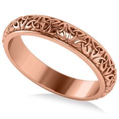 a rose gold wedding ring with an intricate design