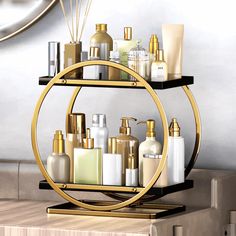 a gold and black shelf with various bottles on it, along with a mirror behind it