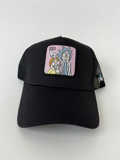 This is a black baseball cap. It is made of 100% cotton and is adjustable to fit most head sizes. It is brand new and has the iconic Rick and Morty patch on the front. Perfect for sports or casual wear. Black Baseball Cap With Curved Visor, Black Hip Hop Baseball Cap, Black Hip Hop Baseball Cap With Curved Bill, Black Trucker Baseball Cap With Curved Visor, Black Hip Hop Dad Hat, Black Hip Hop Baseball Cap One Size, Black Trucker Baseball Cap For Streetwear, Black Hip Hop Baseball Cap With Curved Visor, Black Hip Hop Trucker Hat With Curved Bill