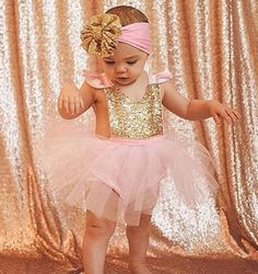 How GORGEOUS is our sequin romper! These rompers are perfect for any special occasion, first birthday, cake smash, holidays, etc. Handmade in Southern California with 100% designer cotton fabrics. All edges and seams have been serged for a professional finish! For best results, hand wash and lay flat to dry on all items that have any special trim, iron on decal or tulle . If it doesn't have any of those items feel free to wash in cold water on delicate cycle, tumble dry low heat or lay flat to d Spring Party Bubble Romper With Ruffles, Fitted Pink Bubble Romper For Party, Summer Party Bubble Romper With Ruffles, Cute Bubble Romper For Spring Party, Cute Spring Party Bubble Romper, Cute Ruffled Bodysuit For Party, Cute Fitted Bubble Romper For Dress-up, Cute Pink Bubble Romper For Party, Sleeveless Bubble Romper For Parties