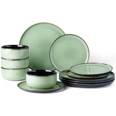 a set of green and black dinnerware