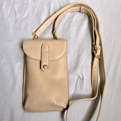 Phone Cross Body In Oat. Brand New, Used Once. Beige Phone Bag With Removable Pouch For Daily Use, Beige Phone Bag With Detachable Strap For Daily Use, Beige Satchel With Cell Phone Pocket For Daily Use, Cream Shoulder Phone Bag For Everyday Use, Daily Use Beige Satchel With Cell Phone Pocket, Beige Phone Bag With Adjustable Strap For Travel, Travel Phone Bag Beige With Adjustable Strap, Beige Travel Phone Bag With Adjustable Strap, Beige Satchel With Mobile Phone Bag For Everyday Use