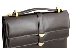 "MORABITO, 1 Place Vendome Paris, vintage handbag of dark brown real leather. Small and rectangular, with two flaps, one closes over the main compartment and the other over the external pocket with a hidden snap button. Extendable short to medium-long handle. Interior lining in brown leather, with three pockets, one with a zipper. This bag has an exceptional leather and finish, made by one of the most upmarket and prestigious handbags firms. Ref.: B0578 CONDITION: Mint SIZE Approx.: 8,66\"L X 6, Classic Flap Bags For Formal Occasions, Formal Bags With Double Flap And Leather Lining, Formal Double Flap Bags With Leather Lining, Classic Rectangular Flap Bag With Top Carry Handle, Modern Brown Satchel For Formal Occasions, Classic Double Flap Business Bag, Modern Brown Formal Satchel, Rectangular Vintage Brown Shoulder Bag For Office, Vintage Brown Rectangular Shoulder Bag For Office