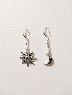 ◆ Earrings with crescent moon and sun these earrings are very beautiful and original the moon represents female entities and consequently fertility, while the sun represents the male entities. The moon measures only 0,629921 inches while the sun 1,06299 inches they are about 2.12598 inches long and are silver plated. ♡ In my shop there are many handmade jewelry for all tastes, come and watch them you are welcome! ♡ ❤ Do you need a custom order? ❤ You can enter a free note to send together with y Celestial Half Moon Single Earring, Celestial Sun And Moon Dangle Jewelry, Symbolic Dangle Earrings With Sun And Moon Design, Bohemian Sterling Silver Sun And Moon Earrings, Bohemian Sun And Moon Sterling Silver Earrings, Symbolic Sun And Moon Dangle Earrings, Celestial Sun Design Dangle Jewelry, Dangle Earrings With Sun And Moon Design For Gift, Silver Half Moon Earrings With Sun And Moon Design