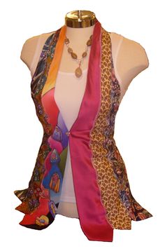 a mannequin wearing a multicolored scarf