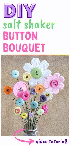 a vase filled with buttons and flowers on top of a wooden table next to the words diy salt shaker button bouquet