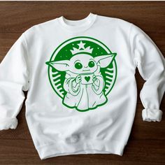 Custom Baby Yoda Sweatshirt Made To Order Choose Your Color Shirt And Design Choose Your Size Printed On Unisex Hanes Or Gildan Sweatshirts Baby Yoda Shirt, Womens Tee, Womens Top, Star Wars Shirt, Customized Tees, Custom Tees, Tshirts, Tees, Yoda, Coffee Tee, Baby Alien, Baby Yoda Sweatshirt, Yoda Sweatshirt, Star Wars Sweater White Cotton Sweatshirt With Character Print, Cute White Sweatshirt With Cartoon Print, Cute White Sweatshirt With Graphic Print, Bebe Yoda, Star Wars Sweater, Yoda Shirt, Star Wars Shirt, Coffee Tees, Shirts Ideas