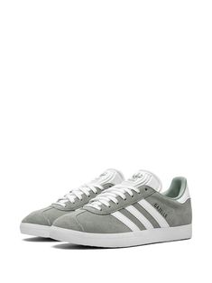 Find ADIDAS Gazelle Grey/white Sneakers on Editorialist. grey suede contrasting branded heel counter logo-debossed tongue gold-tone logo lettering signature 3-Stripes logo front lace-up fastening round toe flat rubber sole These styles are supplied by a premium sneaker marketplace. Stocking only the most sought-after footwear, they source and curate some of the most hard to find sneakers from around the world. Classic Adidas Suede Sneakers, Classic Adidas High-top Sneakers With Logo, Classic Gray Sneakers With Laces, Adidas Classic Custom Sneakers With Gum Sole, Classic Adidas Custom Sneakers With Contrast Sole, Classic Adidas Sneakers With Vulcanized Sole, Classic Gray Sneakers With Boost Midsole, White Suede Adidas Logo Sneakers, Classic Gray Low-top Sneakers