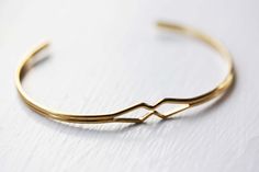 Diamond Bend Cuff Bracelet. $12.00, via Etsy. Vintage Jubilee Cuff Bracelet As Gift, Vintage Jubilee Cuff Bracelet Gift, Vintage Cuff Bangle Bracelet As Gift, Vintage Bangle Cuff Bracelet As A Gift, Retro Gold Bangle As A Gift, Retro Gold Bangle As Gift, Retro Gold Bangle For Gift, Handmade Retro Bangle For Gifts, Retro Gold Bangle Cuff Bracelet