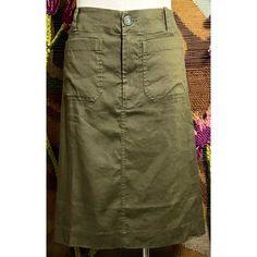 New With Tags Size Xs This Chic Olive Green Skirt Is A Part Of Anthropologie’s Coveted Colette Line. The Skirt Has Two Front Utility Pockets & 2 Back Pockets. The Fabric Is 52% Linen, 46% Viscose, & 2% Elastane. The Closure Is A Double Button & Zipper Combination With A Snap Button Next To The Button To Keep The Waist Smooth. *** The Dress Form Is Wearing A Size Medium. Please See Measurements Below For The Size Xs Fit. In One Of The Pictures The Skirt Is Paired With Anthropologie Maeve Blouse ( Fitted Knee-length Cargo Skirt With Lining, Fitted Cargo Pencil Skirt For Spring, Spring Lined Cargo Skirt, Casual Fitted Knee-length Cargo Skirt, Fitted Long Cargo Skirt Casual Style, Chic Long Fitted Cargo Skirt, Casual Long Cargo Skirt Fitted, Casual Long Fitted Cargo Skirt, Fitted Knee-length Cargo Skirt For Summer