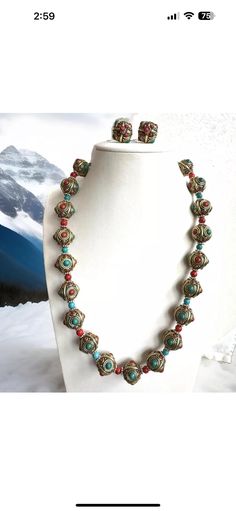 This beautiful Vintage  Indo/Tibet style necklace inlaid with Turquoise and Coral set in Tibetan copper beads. This beautiful necklace is handmade by skilled artisan from Himalayan region.This beautiful necklace Length is 22"inches long and comes with matching earrings made by skilled artisan from Tibet.Beads size are 17mm and it weighs stunning 192 grams.Thank you. Tibetan Turquoise, Turquoise And Coral, Brass Beads, Artisan Earrings, Coral Stone, Copper And Brass, Handmade Copper, Beautiful Necklace, Style Necklace