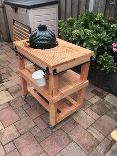 a wooden table with a pot on it