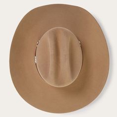 The Monterey combines legendary Stetson quality and classic western style in one timeless package. It’s crafted from our proprietary 6X fur felt, which is prized for its durability and elegant feel, and, as with all hats that come out of our factory in Texas, each Monterey is touched by more than 100 sets of hands during production, resulting in a hat that is designed and built to stand the test of time. It features a 4 1/4” cattleman crown and 4 1/4” brim, and it’s finished with a rugged tooled Grooming Shop, Hat Bands, Stetson Hat, Leather Hat, Casual Bottoms, Denim Boots, Wide Trousers, Thigh Boot, Leather Hats