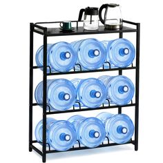 a black rack with blue plates stacked on it