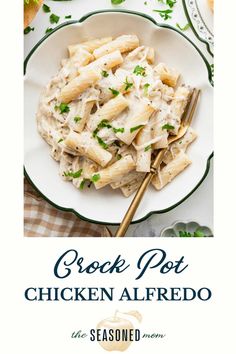 chicken alfredo in a white bowl on top of a green and white checkered table cloth