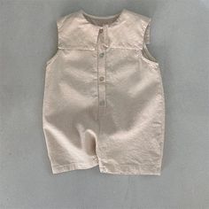 This Sleeveless Button-Down Jumpsuit is perfect for your little fashionista! ✨ Made from soft, breathable cotton, this adorable jumpsuit features a classic button-down design and a comfortable mid-waist silhouette. Whether your little one is playing in the park or attending a special event, this jumpsuit will keep her looking and feeling stylish all day long. 🌸 #kidsfashion #summerstyle #buttondownjumpsuit Specifications: Material: Cotton Fit: Fits true to size, take your normal size Waist Type Girls Jumpsuit, Style 2023, Romper Outfit, Girls Blouse, Children Clothing, Kids Outfits Girls, Short Jumpsuit, Kids' Fashion, Blouse Dress