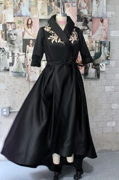 This stunning black satin mother of the bride/groom gown is an elegant and timeless choice for any special occasion. Crafted from a luxurious black satin fabric and finished with a beautiful gold applique, this gown is the perfect way to make a sophisticated statement. The sleek silhouette and subtle yet stunning details make this the perfect choice for the mother of the bride or groom.
Size 14 Elegant Black Evening Dress For Wedding Guest, Elegant Embroidered Gown For Wedding Guest, Elegant Embroidered Gown For Mother Of The Bride, Elegant Gown With Gold Embroidery, Fitted Black Evening Dress For Wedding Guest, Elegant Gala Dress With Gold Embroidery, Black Satin Wedding Gown, Elegant Embroidered Mother Of The Bride Dress, Elegant Party Gown With Gold Embroidery