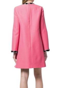 This velvet trim dress is a perfect pop of colour for your next evening event.Crafted from a luxury bubblegum pink wool-silk blend, this Gucci dress features a round neck, a back zip fastening, long sleeves, a flared style and is decorated with a velvet and crystal weave style trimming to the neckline and cuffs for added feminine edge.Composition Wool 51%, Silk 49%Lining: Acetate 71%, Silk 29%Made in Italy Long Sleeve Gucci Dresses For Fall, Gucci Knee-length Cocktail Dress, Spring Pink Gucci Dress, Gucci Pink Dress For Spring, Gucci Pink Spring Dress, Elegant Gucci Cocktail Mini Dress, Chic Pink Gucci Dress, Gucci Knee-length Dress For Spring, Gucci Mini Dress For Evening