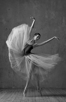 black and white photo of ballerina in tutu