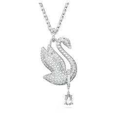 Inspired by the iconic Swarovski Swan, this long necklace has reimagined the inspiring silhouette with an all-over pavé of shimmering clear crystals on sleek rhodium plating. For added movement, a single precision-cut stone dangles from the swan's elegant neck. Wear this piece and feel the spirit of flight. Swarovski Crystals Necklace, Swarovski Necklace Swan, Swarovski Swan Necklace, Swan Necklace, Swarovski Swan, Expensive Jewelry Luxury, Swarovski Crystal Necklace, Swarovski Necklace, Girly Accessories