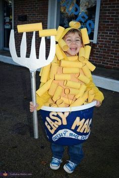 a young boy in a costume made out of cheese sticks