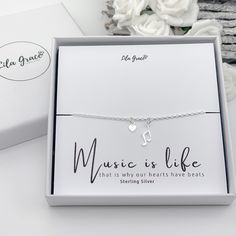 "The perfect gift for a musician or lover of music, a sterling silver bracelet with a beam musical note charm, optional mini heart charm can be added, this can be left blank or personalised with your chosen letter. You choose the bracelet size, packaging and have the option to personalise the jewellery card. All my jewellery is made to order so you choose the bracelet size, 1/2 inch extenders available to be added to the bracelet, if unsure on sizing choose the multi size (fully adjustable from Lovers Symbol, Music Bracelet, Jewellery Card, Girls Bracelet, Bracelet For Girls, Music Symbols, Symbolic Jewelry, Gift For Her Birthday, Musical Note