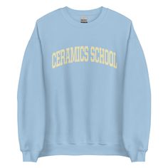 "A quintessential collegiate crewneck. An off-white arched typeface design with a vintage print effect. A warm and classic wardrobe staple. This item is MADE-TO-ORDER upon order placement. All sales final. Please see delivery estimates below. * 50% cotton, 50% polyester * Pre-shrunk * Classic fit * 1x1 athletic rib knit collar with spandex * Air-jet spun yarn with a soft feel and reduced pilling * Double-needle stitched collar, shoulders, armholes, cuffs, and hem * Gildan 18000 crewneck CARE: WA Peach Pie, Happy Design, Classic Wardrobe Staples, College Sweatshirt, Typeface Design, Gildan Sweatshirts, Kids Swimwear, Vegan Lifestyle, School College