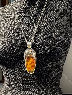 "Artisan Amber with pearls pendant Hand-made Sterling Silver 925. Stones used: Baltic Cognac Amber, Pearls. Height -3 2/16\" (with bail), Width - 1 3/16\" Height - 80mm, width-30mm. Unique Handcrafted One-of a-kind Design Pendant Each Piece of Jewelry in my Collection is Absolutely One of a Kind! When you start wearing a piece of my jewelry you will fall in love with it more and more each day and feel that good Energy and Love that I pass into it while creating this piece of Art. A piece of Art Amber Colored Metal Pendant Jewelry, Amber Pendant Necklace With Cabochon, Modern Amber Pendant Jewelry, Amber Faceted Pendant Jewelry, Artisan Amber Pendant Necklace, Amber Stone, Bronze Pendant, Statement Pendant, Good Energy