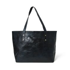 Introducing the everyday shopper shoulder tote, a lightweight marvel that transcends style and functionality. With one central compartment accommodating files, diaries, documents, and laptops, it blends practicality with sophistication. Contrasting metal buttons on the handles and bottom offer structural support, defining its chic design. This tote black with a touch of blue shade bag isn't just a fashion statement; it's crafted from eco-friendly buffalo leather, naturally tanned without chemica Buffalo Leather, Black Tote, Black Tote Bag, Shoulder Tote, Metal Buttons, Chic Design, Stylish Accessories, Large Bags, Fashion Statement