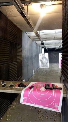 an indoor shooting range is shown in this photo