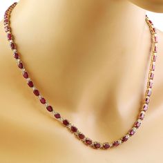 Stamped: 14K Total Necklace Weight: 25.4 GramsLength: 17 Inches Ruby Weight: 31.81 Carat (6.00x4.00 Millimeter)Diamond Weight: 1.50 Carat (F-G Color, VS2-SI1 Clarity Face Measures: 6.00 Millimeter SKU: [600022] Formal White Gold Tennis Necklace With Gemstone, Formal Gemstone Tennis Necklace, Classic Gemstone Tennis Necklace - Gift, Red Diamond Cut Necklace For Formal Occasions, Formal Ruby Diamond Necklace With Brilliant Cut, Classic Ruby Necklaces For Formal Occasions, Formal Red Diamond Cut Necklace, Formal White Gold Ruby Necklace, Aaa Quality Red Jewelry For Formal Occasions