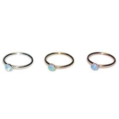 This is a very beautiful sterling silver opal nose ring. This modern and stylish piece of jewelry can add value to any outfit. It can be used for earlobe, cartilage, helix and tragus piercing as well. * The listing is for 1 (one) hoop. * Wire ends were rounded and polished to provide you with a smooth end for insertion. The earring was then polished. * Available inner diameters in millimeters (widths) for your ring: 7mm, 8mm, 9mm, 10mm * You can choose among variety of gemstones for this item. P Hypoallergenic Round Opal Jewelry, Sterling Silver Birthstone Piercings, Minimalist Nickel Free Nose Ring, Hypoallergenic Sterling Silver Round Septum Ring, Dainty Pierced Round Nose Rings, Hypoallergenic White Gold Nose Rings, Dainty Internally Threaded Nose Rings, Dainty Small Hoop Hypoallergenic Rings, Dainty Hypoallergenic Round Nose Rings