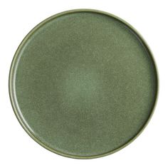 an empty green plate on a white background