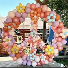 a bunch of balloons that are in the shape of an o's on a table