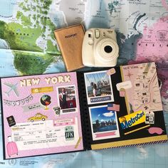 a map, camera and passport are on the table