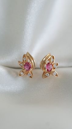 * Earring Material: Ruby, Diamond, 18K Yellow Gold * Earring Dimensions:  0.4x0.5 Inch * Stone Weight & sizes: 2 Ruby - 0.60ct, Diamond - 0.08ct  * Overall weight: 2.8g * Earring Material: 18k yellow gold, Post Push Back Pretty Gold Necklaces, Antique Gold Earrings, Flower Earrings Gold, Ruby Earrings Studs