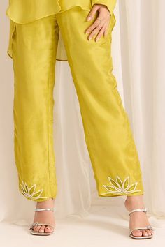 Yellow sheer high-low shirt with bead embellished lotus patterns. Comes with pant and inner bustier. - Aza Fashions Elegant Embellished Summer Pants, Elegant Embellished Summer Pant Set, Elegant Embellished Pant Set For Summer, Elegant Festive Bottoms With Traditional Drape, Summer Festive Pant Set With Traditional Drape, Embroidered Bottoms For Summer Wedding, Embroidered Summer Wedding Bottoms, Summer Wedding Embroidered Bottoms, Elegant Designer Wear Bottoms