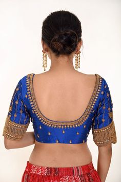 Make a statement with this stunning Blue Bridal Silk Blouse featuring intricate Hand Embroidery work. Blue Top With Resham Embroidery For Navratri, Navratri Blue Tops With Resham Embroidery, Blue Bollywood Top With Floral Embroidery, Blue Bollywood Blouse For Reception, Bollywood Style Blue Blouse For Reception, Blue Blouse With Zari Work For Reception, Blue Embroidered Bollywood Blouse, Blue Blouse For Reception And Festivals, Blue Fitted Traditional Embroidered Top