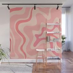 an abstract pink and white wall mural in a living room