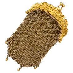 We are thrilled to show you these magnificent French heirlooms. This rare and glamorous treasure dates back to the Art Nouveau period. It is a delightful miniature mesh coin purse with a very detailed hing closure and hundreds of hand made small links woven together. This 18 ct yellow gold jewel is hallmarked with a French eagle head and is in very good condition considering its age. It is in perfect working condition and a pleasure to wear. We like to mention that the back of the purse has deeper scratches as clearly visible in the pictures. This 18k solid gold purse is, like most items from this period, dipped in a very yellow gold. Meaning that there is an extra yellow layer on top of the already solid gold base. This is why the gold, revealed by the scratches, has a different colour. W Handmade Victorian Gold Bags, Vintage Gold Pouch Bag, Luxury Gold Bags For Ceremonial Occasions, Antique Handmade Wedding Bags, Vintage Handmade Gold Coin Purse, Vintage Gold Handmade Coin Purse, Antique Gold Rectangular Bag, Vintage Gold Coin Purse For Wedding, Handmade Vintage Gold Coin Purse