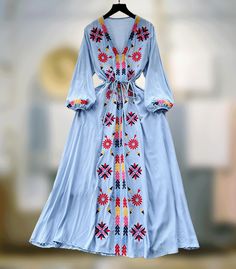 Embrace the spring-summer charm with this French sweet dress. Featuring a V-neck, delicate embroidery, drawstring waist, and a wide swing silhouette for a retro ethnic allure. One size: Length 48.4 inches (123 cm) Bust 38.6 inches (98 cm) Sleeve 18.1 inches (46 cm) Waist 34.6 inches (88 cm) **Additional Notes** - Production Variance: There may be a deviation of 0.39-1.18 inches (1-3 cm) due to different production batches. Please allow for this variability. - Size Comparison: If you are unsure a Bohemian V-neck Dress With Tie Waist, Spring Festival Embroidered V-neck Dress, Traditional V-neck Boho Dress For Spring, V-neck Drawstring Dresses For Spring, Bohemian Drawstring Maxi Dress For Summer, Spring Peasant V-neck Dress, Spring Bohemian Maxi Dress With Drawstring, Bohemian Spring Maxi Dress With Drawstring, Bohemian Maxi Dress With Drawstring For Spring