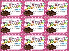 some kind of chocolate bar with the words cosmic year on it and an image of a cake