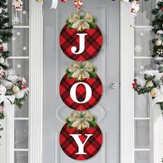 christmas door hangers with the word joy on them