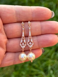 These are beautiful bridal earrings.  Made to order, fast shipping! 💕rose gold plated over brass components with cubic zirconia crystals, Swarovski  cream pearls 💕earrings are approx 2 inches or 5 cm  top to bottom  Thank you so much for your custom! Classic Rose Gold Bridal Earrings For Wedding, Elegant Rose Gold Bridal Earrings, Rose Gold Cubic Zirconia Bridal Earrings For Wedding, Elegant Rose Gold Earrings For Wedding, Rose Gold Elegant Bridal Earrings, Elegant Rose Gold Bridal Earrings With Elegant Design, Elegant Rose Gold Bridal Earrings For Wedding, Elegant Rose Gold Pearl Earrings For Wedding, Rose Gold Delicate Bridal Earrings For Formal Occasions